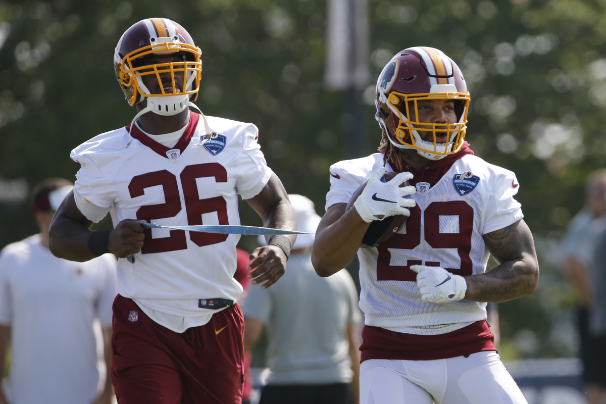 Adrian Peterson - Derrius Guice: Steve Helber-AP via Imagn Content Services, LLC